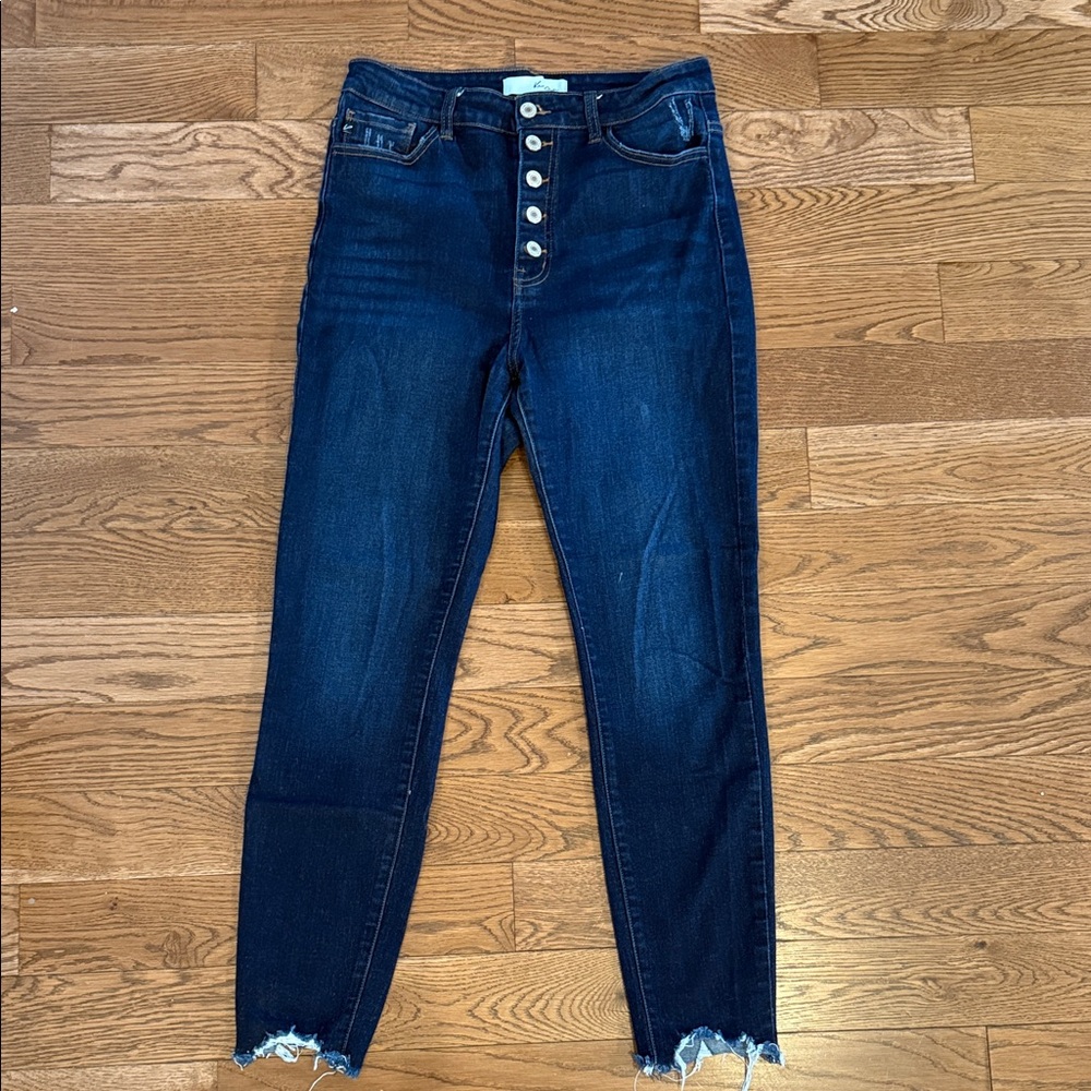 Button front high-rise stretch, skinny jeans with distressed bottoms